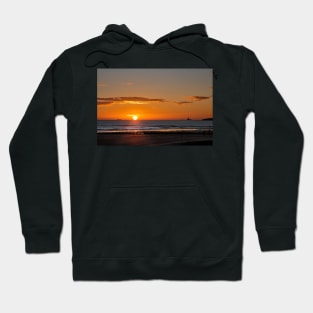 Sunrise over a tranquil North Sea Hoodie